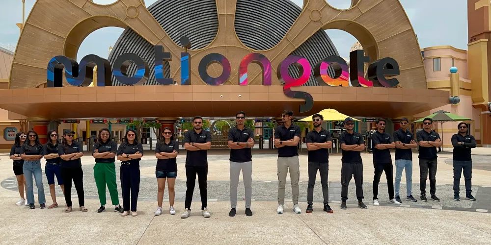 The team lined up in front of the Motiongate entrance